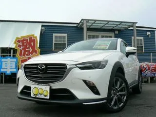 マツダCX-3１００周年特別記念車　ワンオーナー　衝突軽減ブレーキ　純正ナビ地デジ　３６０度カメラ　赤革シート　パワーシート　両席シートヒーター　ＬＥＤヘッドライト　ヘッドアップディスプレイ　ドラレコ　スマートキーの画像