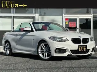 BMW2シリーズカブリオレ赤レザー　Bカメラ　ナビ　18AW　禁煙の画像