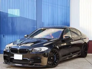 BMWM5セダンハーマン21AW　可変マフラー エアロ 赤革の画像