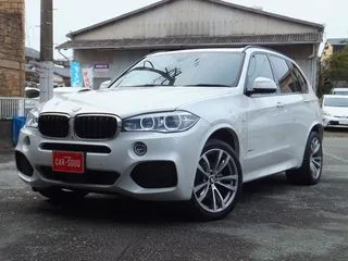 BMWX5黒革/サンルーフ/純正ナビ/電動バックドアの画像